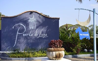 Hotel entrance at Puerto De Luna Pet Friendly & Family Suites.