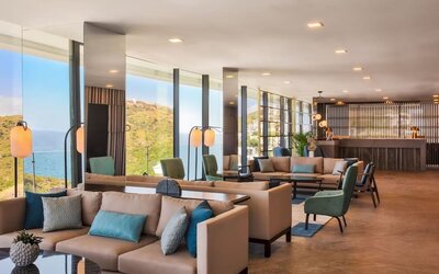 Lobby and coworking area at Le Méridien Bodrum Beach Resort.