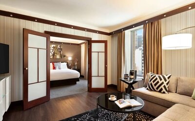 Spacious king suite with lounge area at Sofitel Philadelphia At Rittenhouse Square.