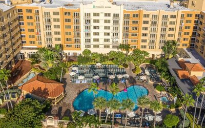 Hotel with large outdoor pool at Embassy Suites By Hilton Deerfield Beach Resort & Spa.