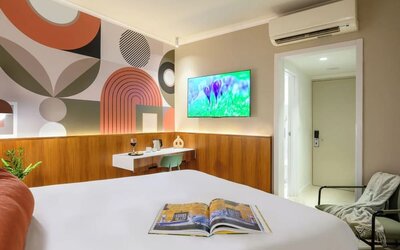 Romantic king room with AC at Prima Vera Hotel.