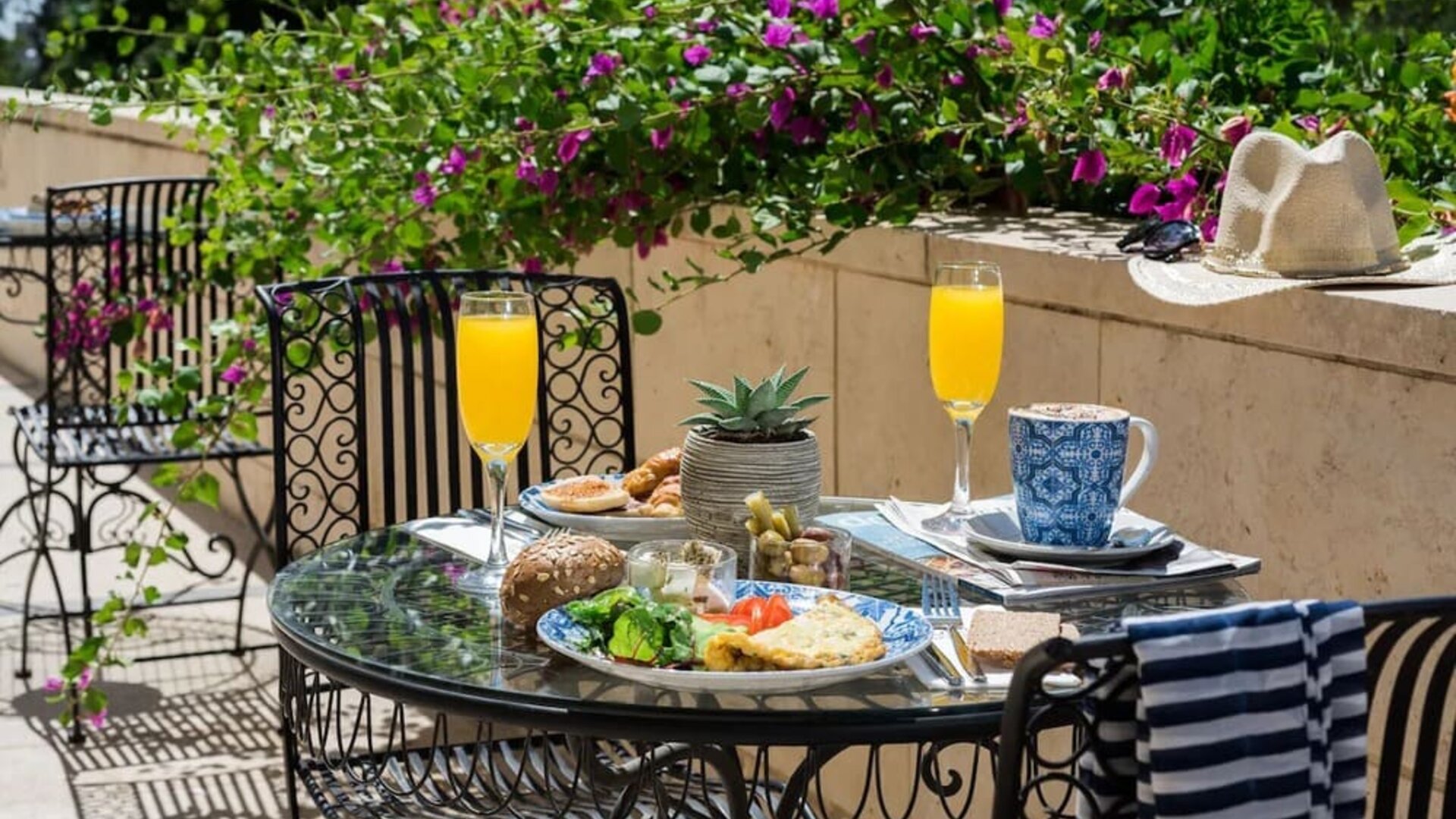 Breakfast available on outdoor terrace at Prima Royale Hotel.