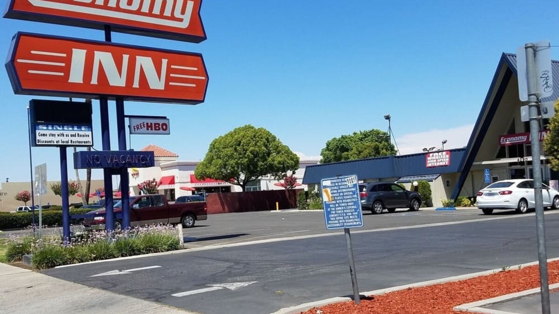 Hotel exterior at Economy Inn, Fresno.