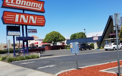 Hotel exterior at Economy Inn, Fresno.