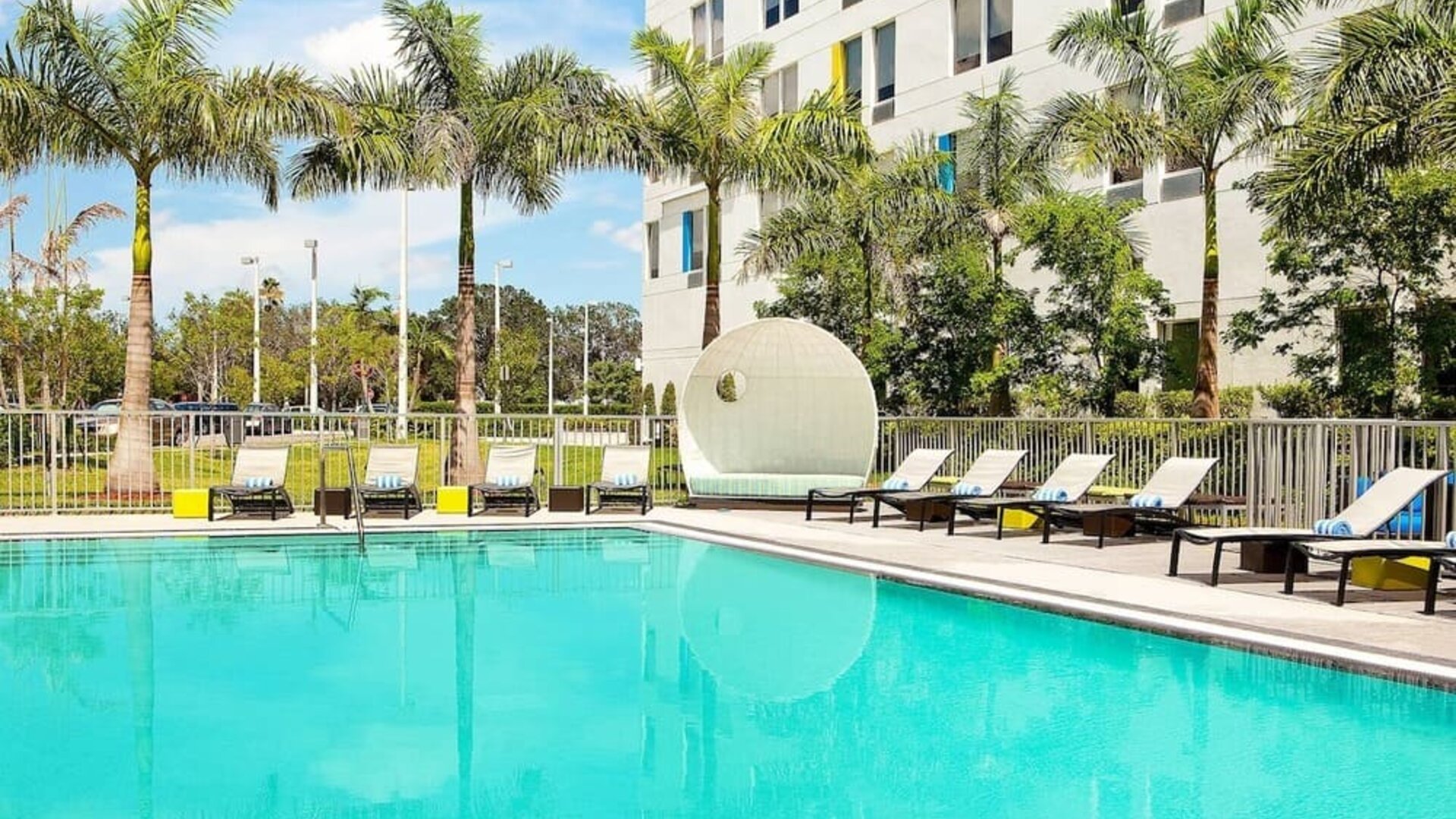Outdoor pool at Aloft Miami Doral.
