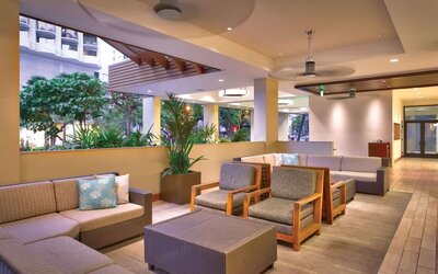 Lounge and coworking space at Hyatt Place Waikiki Beach.