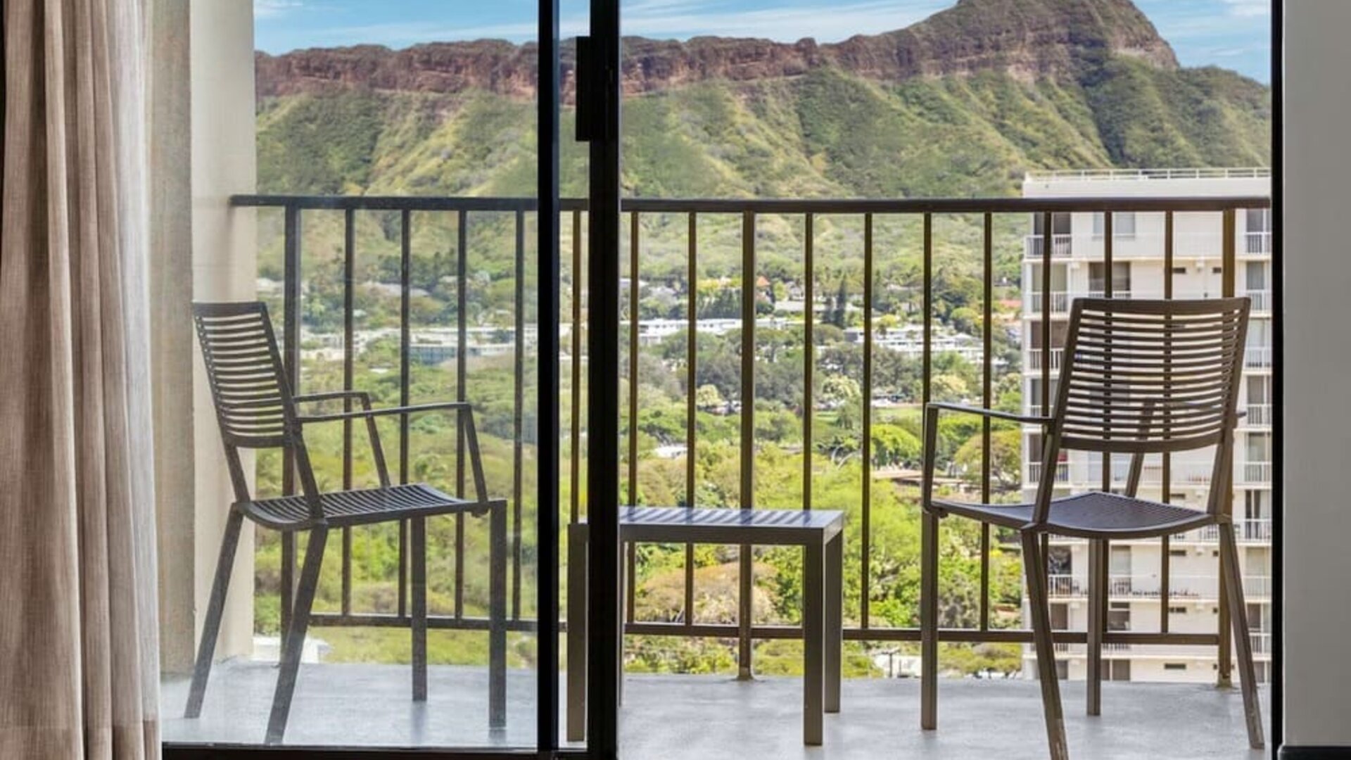 Balcony with mountain view at Hyatt Place Waikiki Beach.