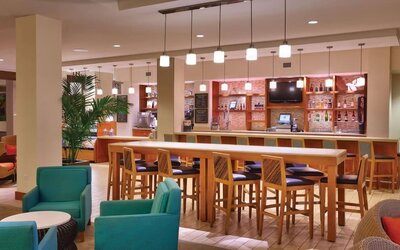 Hotel bar and coworking area at Hyatt Place Waikiki Beach.