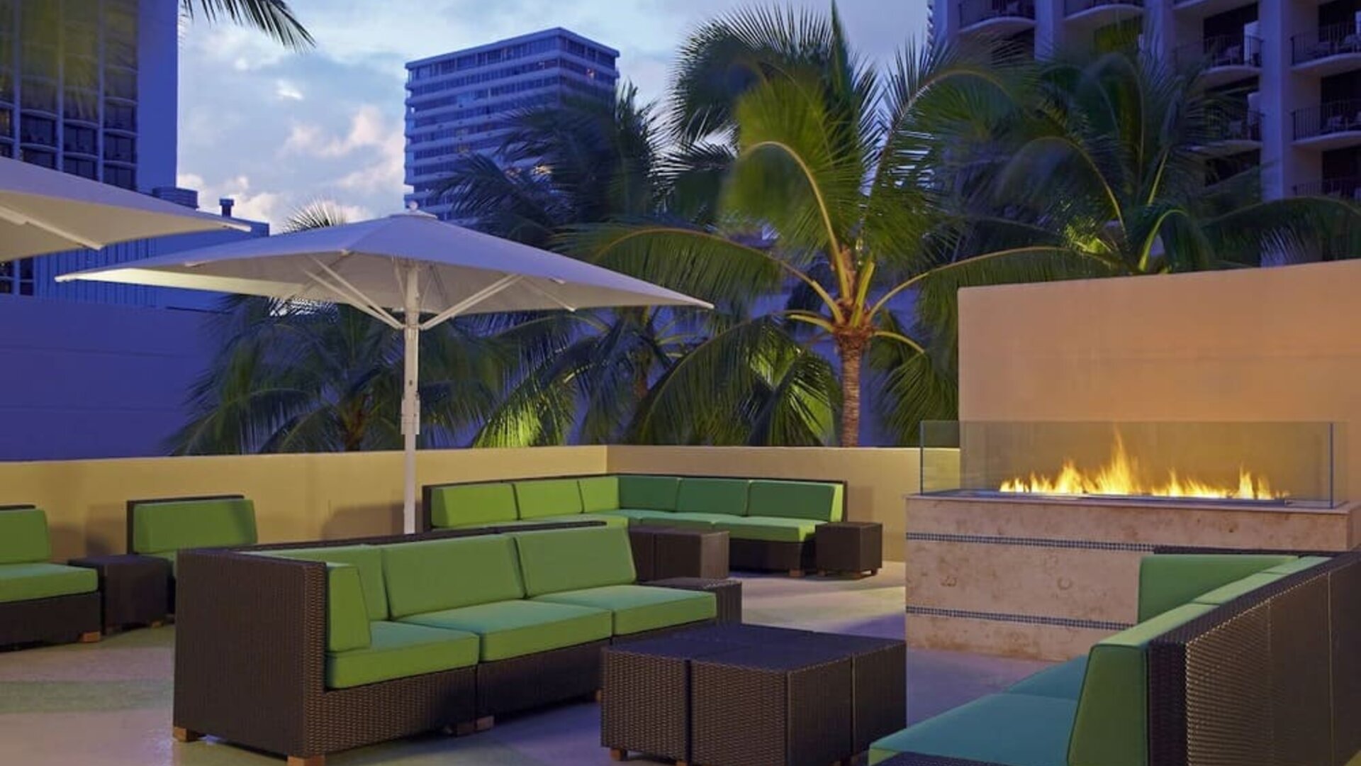 Rooftop terrace and fire pit at Hyatt Place Waikiki Beach.