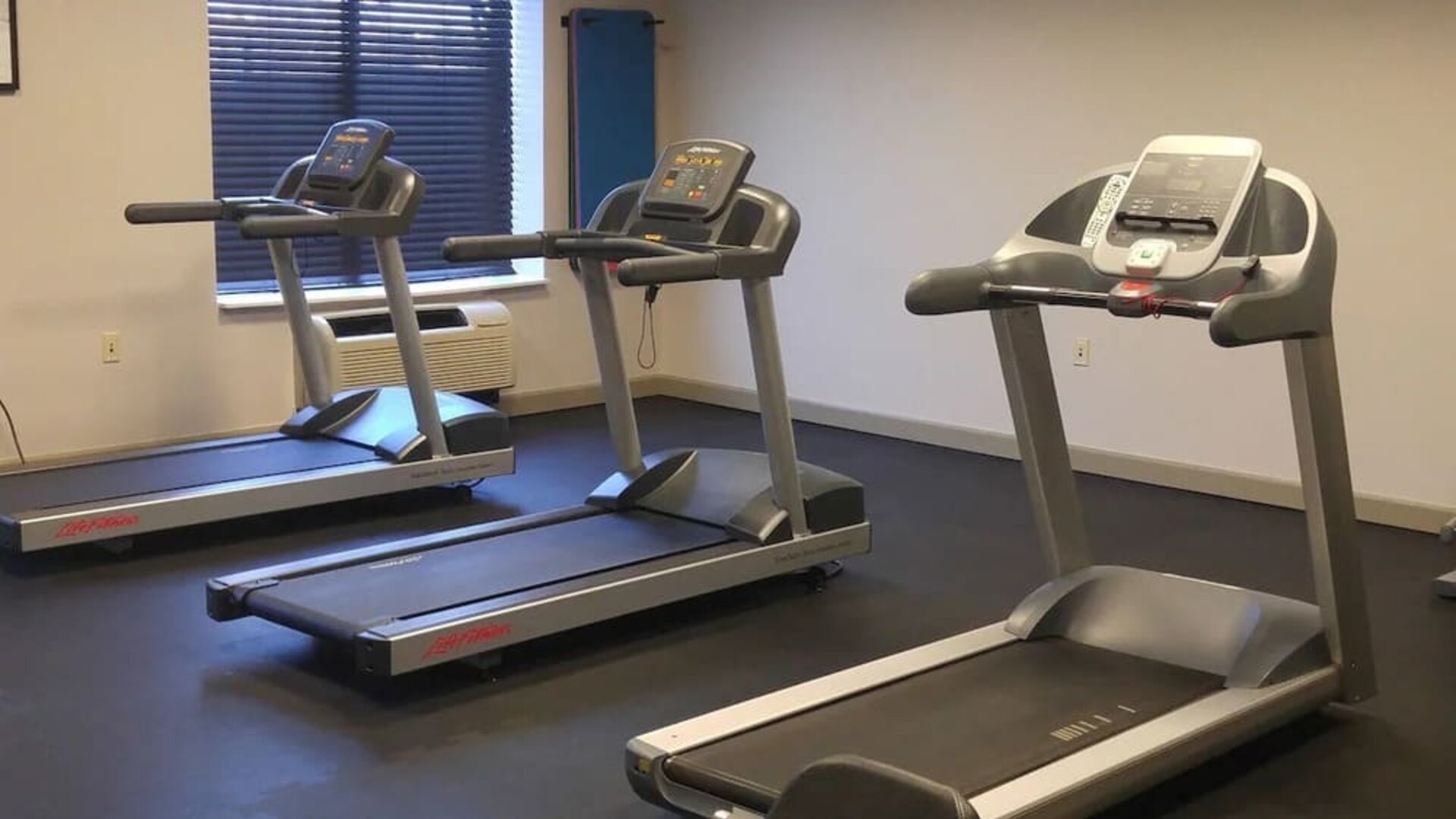 Fitness center at Country Inn & Suites By Radisson, BWI Airport.