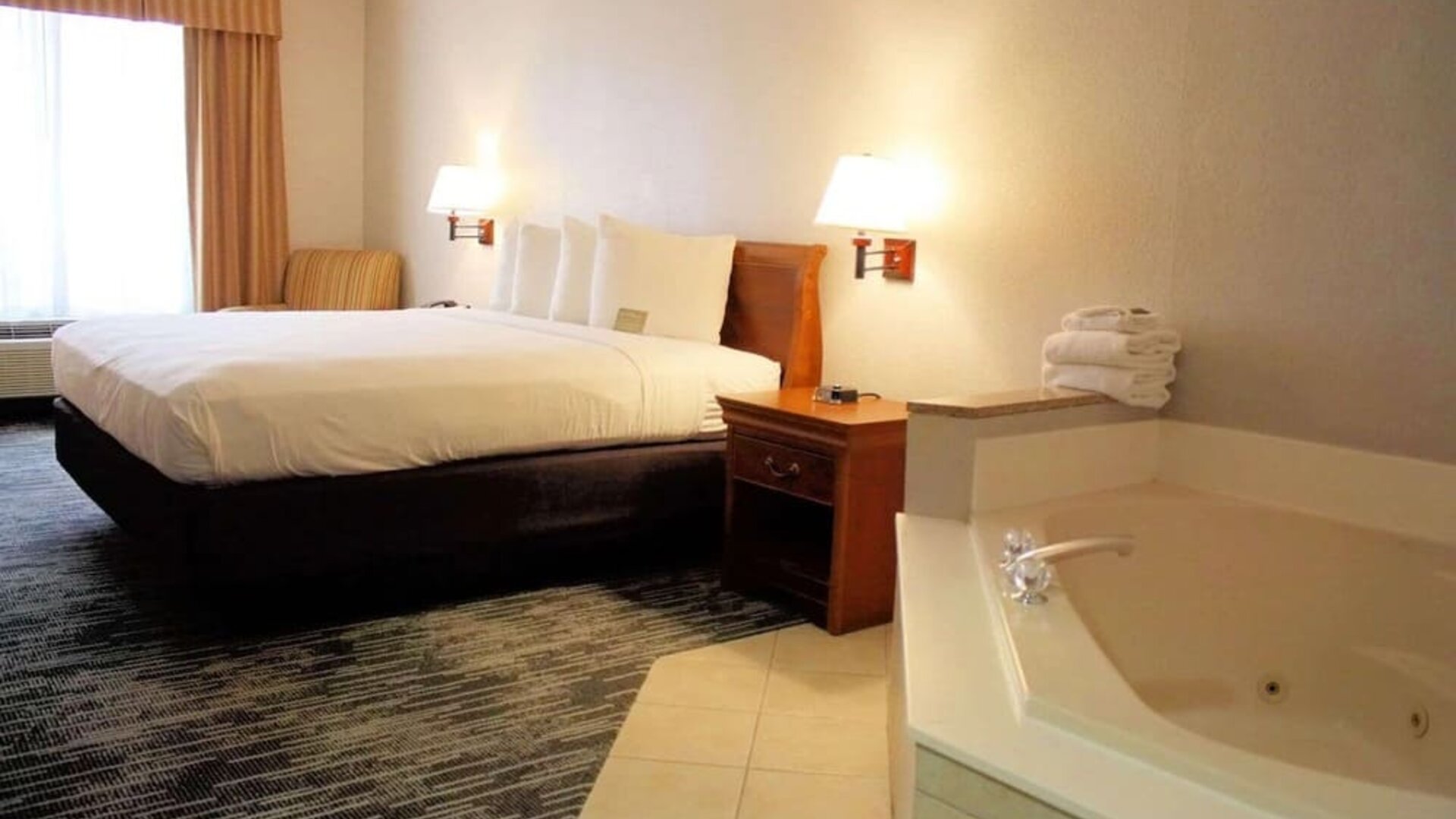 Romantic king room with hot tub at Country Inn & Suites By Radisson, BWI Airport.