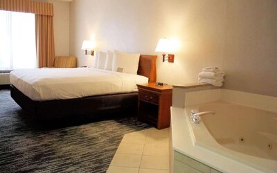Romantic king room with hot tub at Country Inn & Suites By Radisson, BWI Airport.