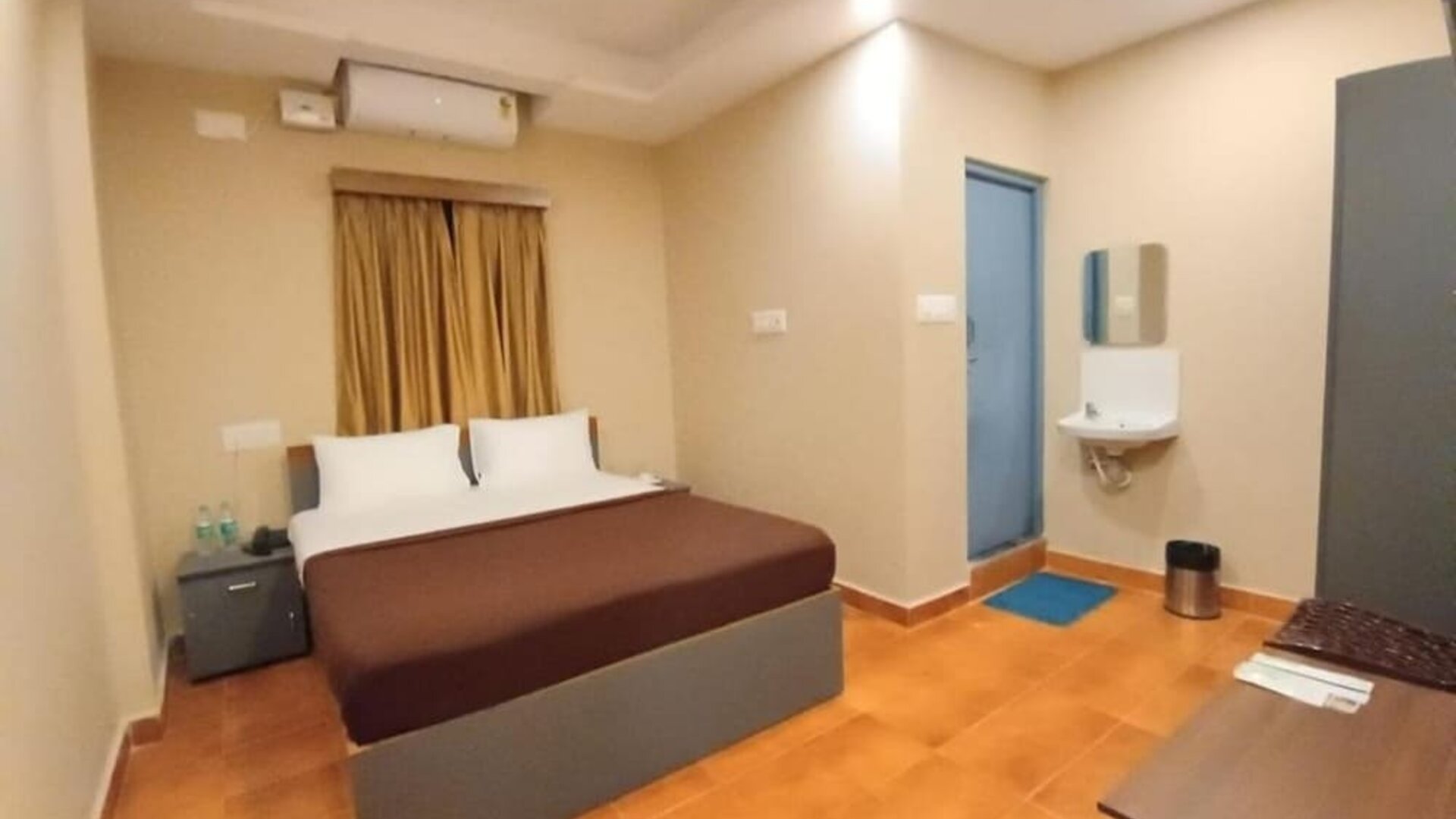 Day room with AC and fan at The Nisarga Residency.