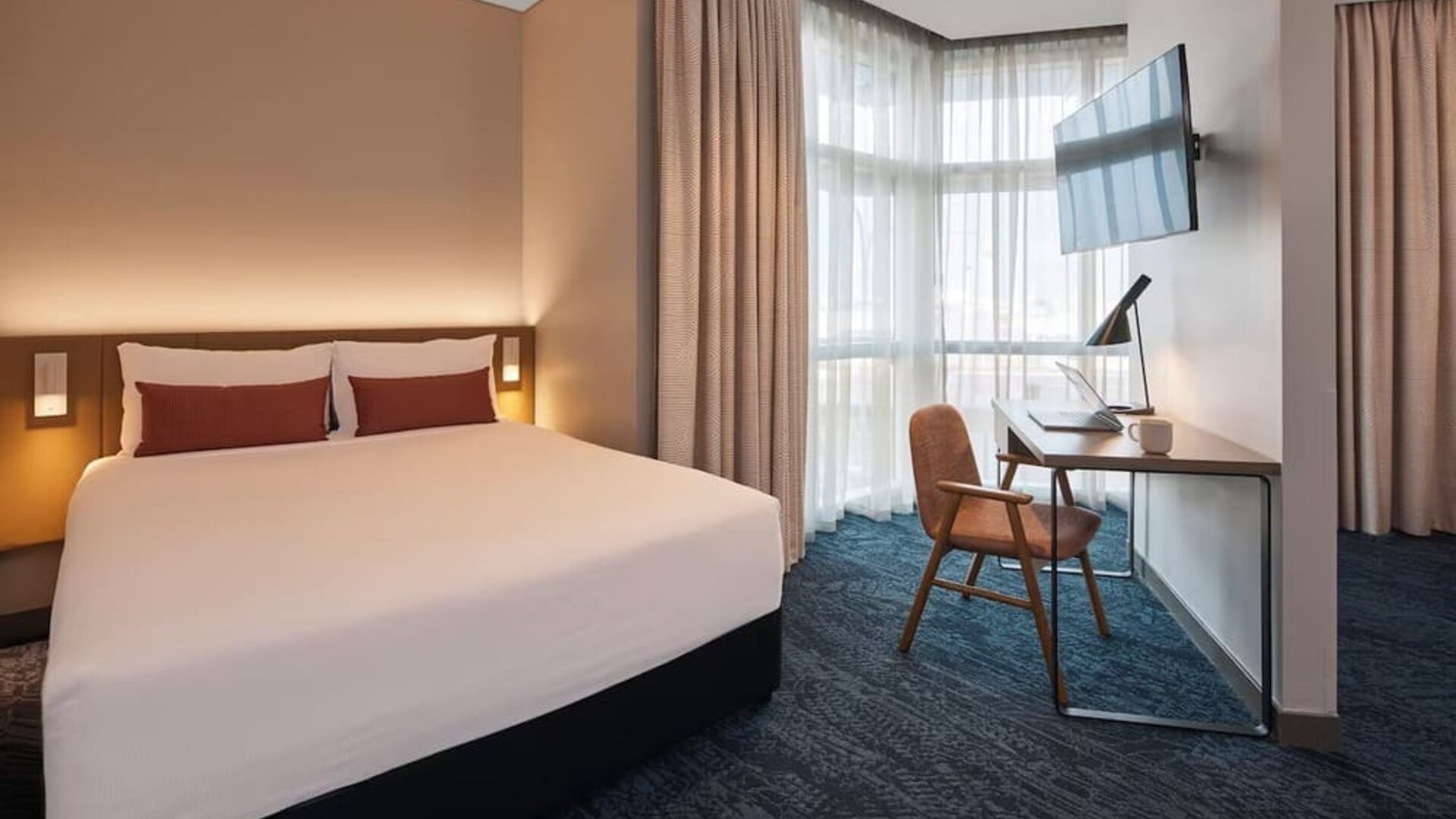 Spacious king room at Rydges Sydney Airport Hotel.