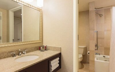 Guest bathroom with shower at Washington Dulles Marriott Suites.