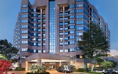 Hotel exterior at night at Washington Dulles Marriott Suites.