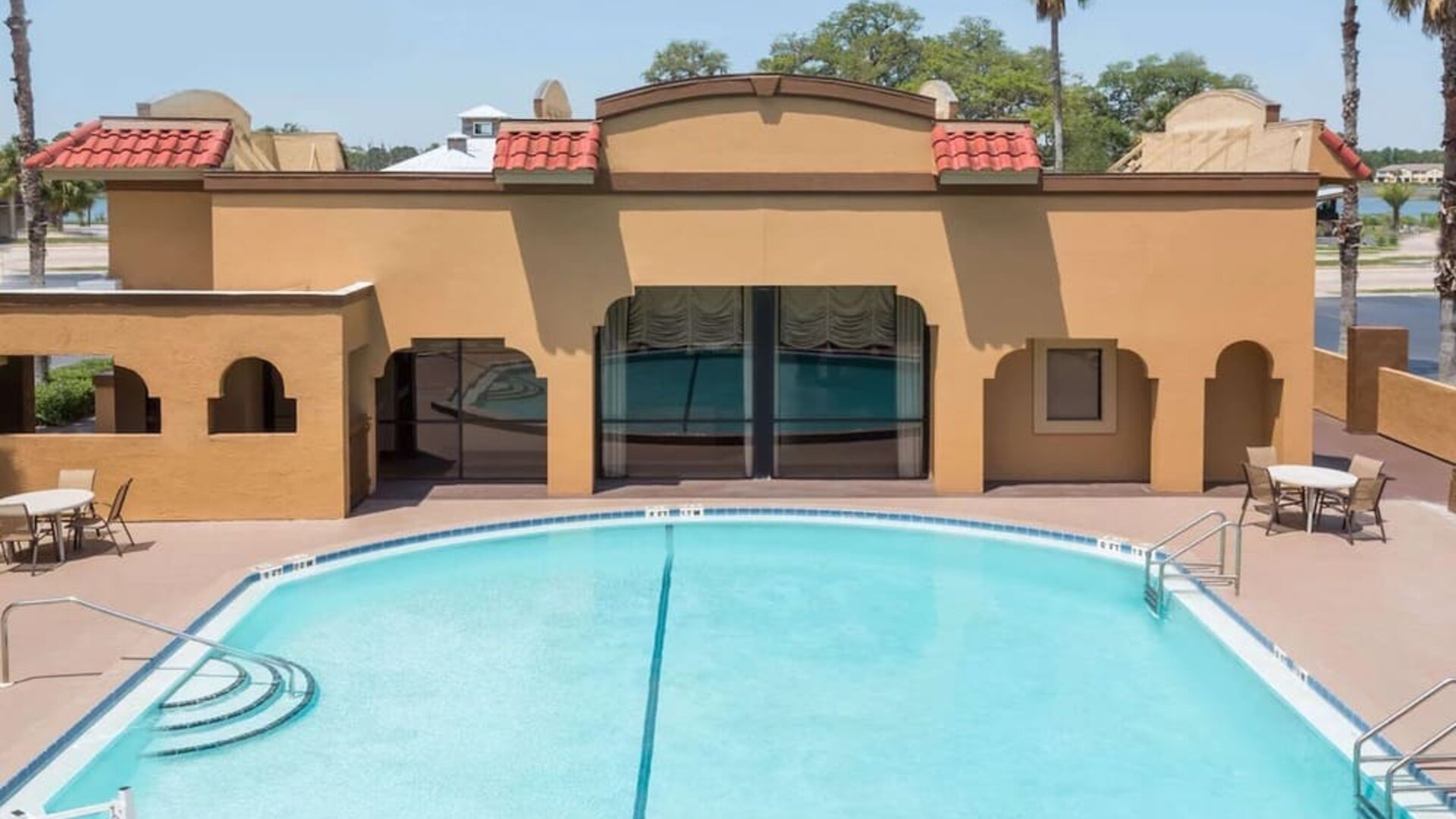 Outdoor pool at Days Inn By Wyndham St Augustine/Historic Downtown.