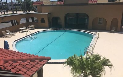 Outdoor pool area at Days Inn By Wyndham St Augustine/Historic Downtown.