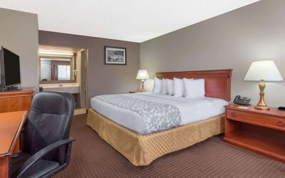 Day room with TV at Days Inn By Wyndham St Augustine/Historic Downtown.