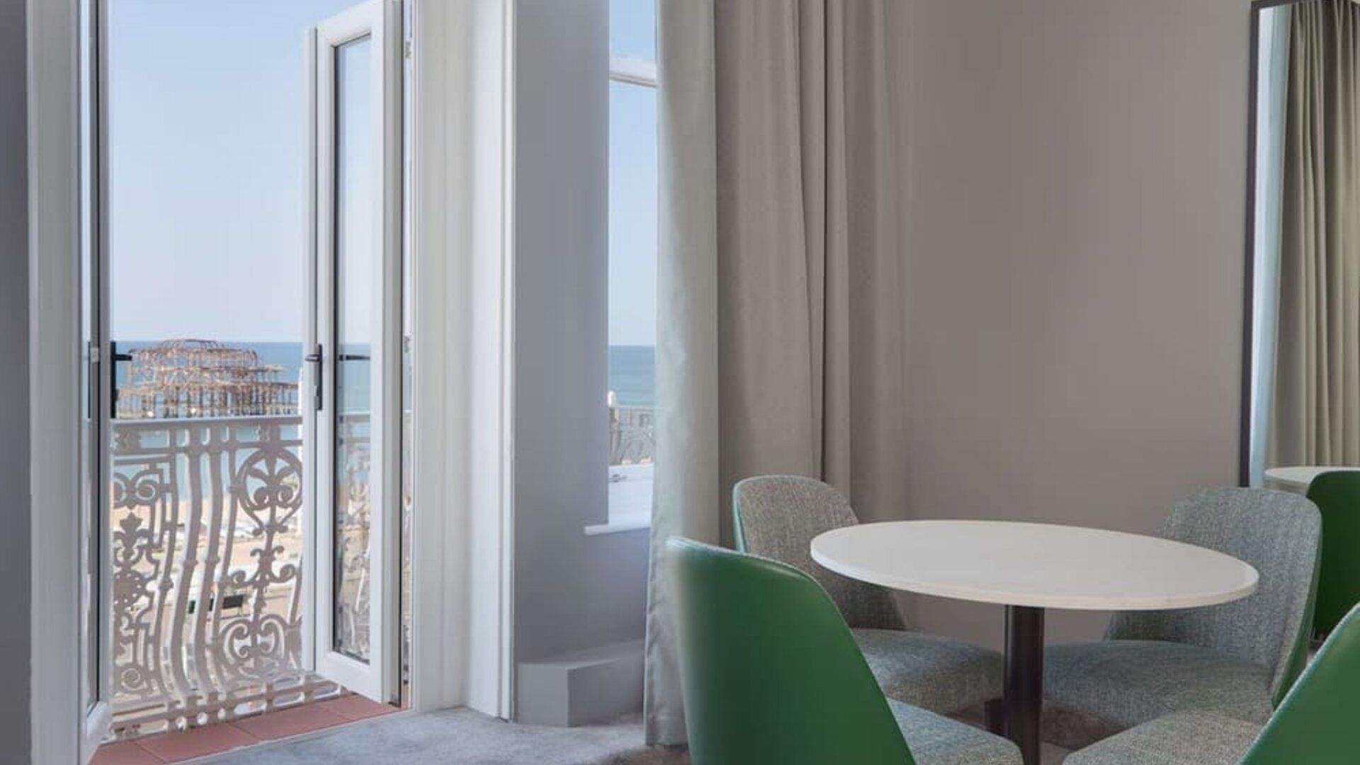 In-room workspace with beautiful view from the balcony at DoubleTree By Hilton Brighton Metropole.