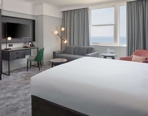 Day use room with work desk and lounge area at DoubleTree By Hilton Brighton Metropole.