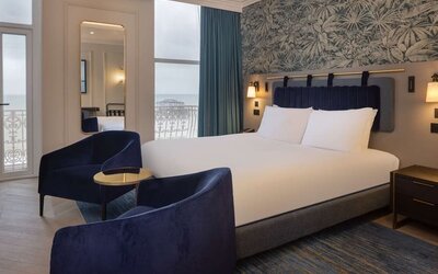 King room with lounge seating at DoubleTree By Hilton Brighton Metropole.
