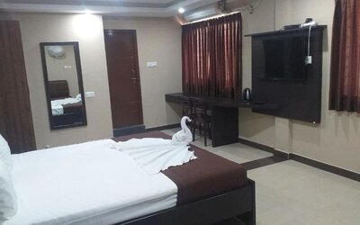 Day use room with TV at The Nisarga Grand.