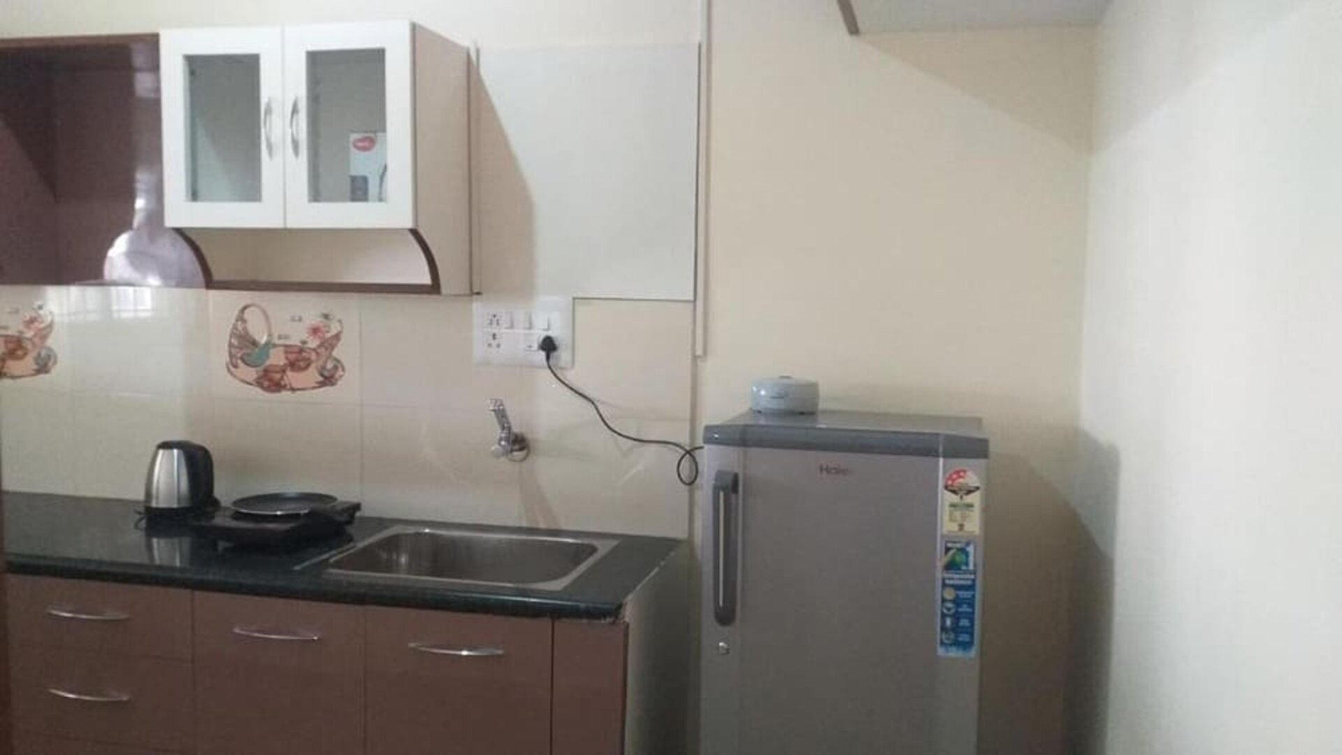 Day room with kitchen at The Nisarga Grand.