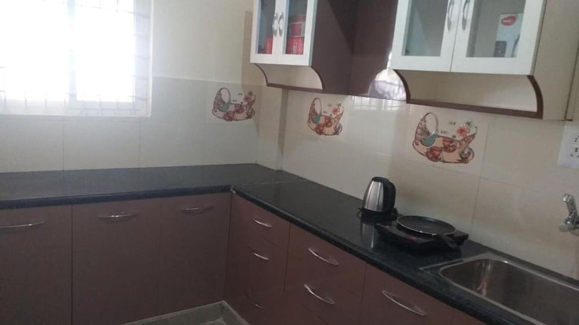 Kitchen and coffee maker at The Nisarga Grand.