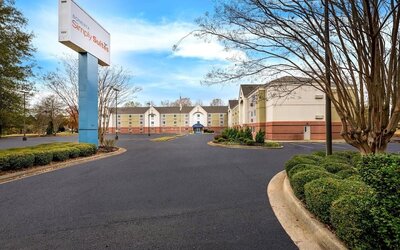 Sonesta Simply Suites Huntsville Research Park’s exterior and parking. 