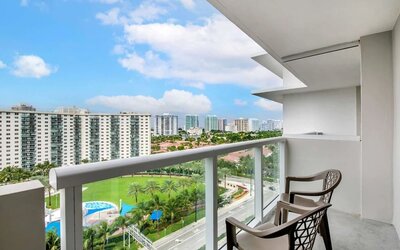 Day room with balcony at Ramada Plaza Marco Polo Beach Resort.