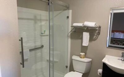 Guest bathroom with shower at North Bay Inn.