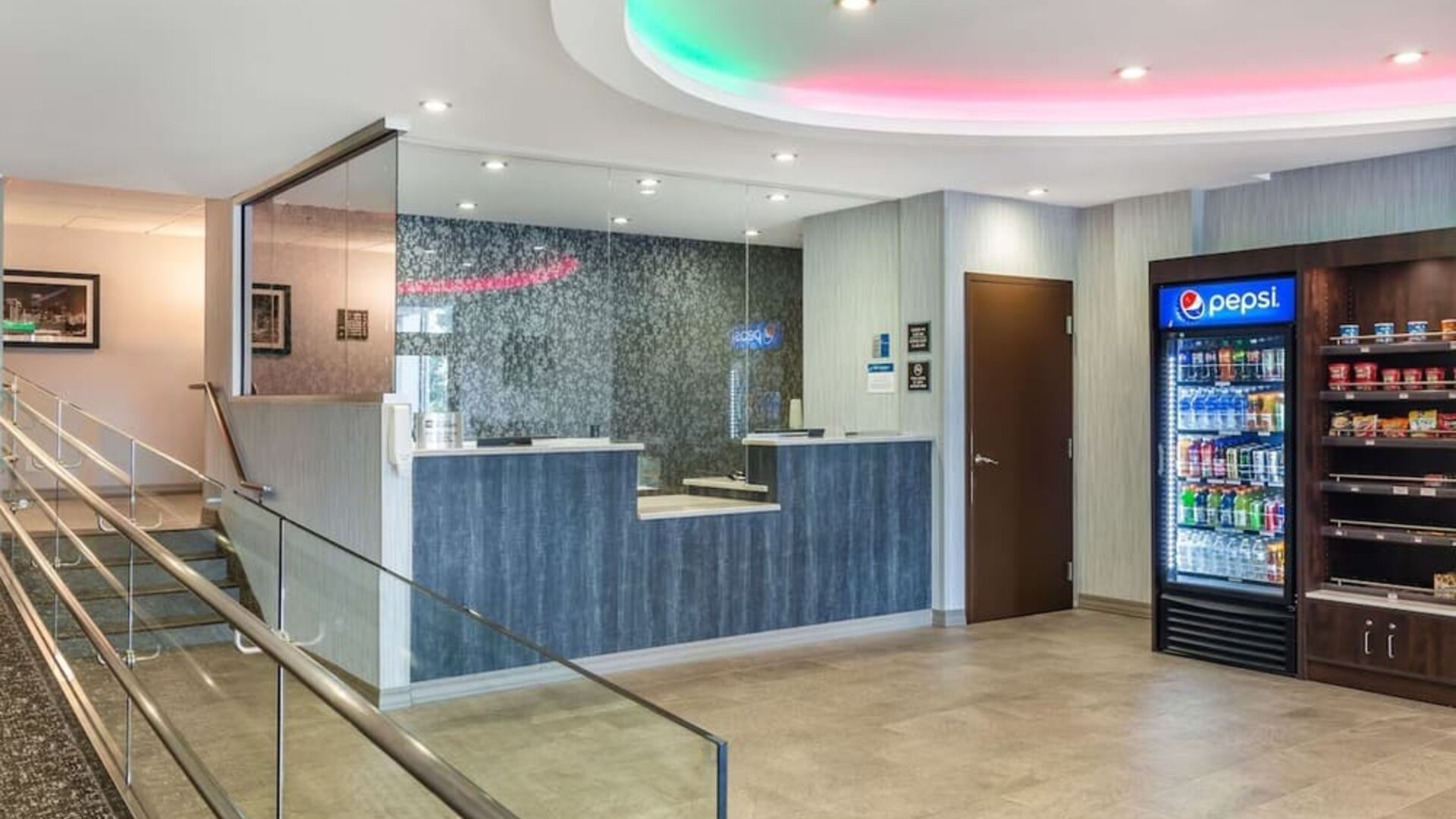 Welcoming lobby lounge with comfortable seating, snack station, and contemporary design at Best Western Braintree.