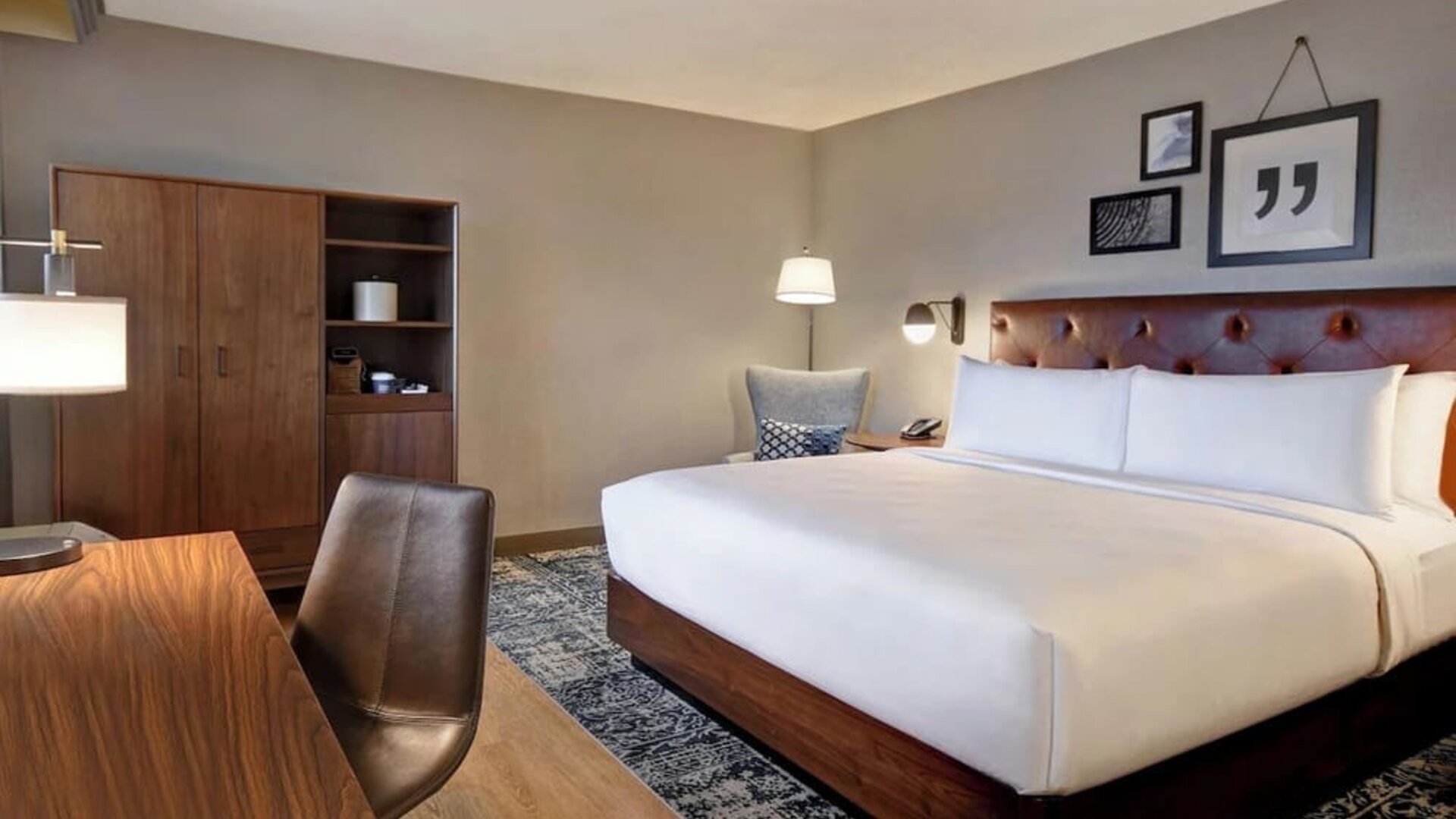 King guest room featuring contemporary furnishings, premium bedding, and a dedicated workspace for business or leisure stays at Four Points by Sheraton Boston-Newton.