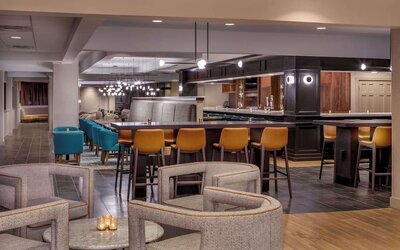 Stylish restaurant and lounge area featuring modern décor, comfortable seating, and a welcoming atmosphere for dining and cocktails at DoubleTree by Hilton Westborough.