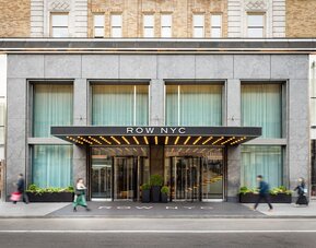 Main entrance of Row NYC featuring a contemporary façade, elegant lighting, and a welcoming arrival experience in the heart of New York City.