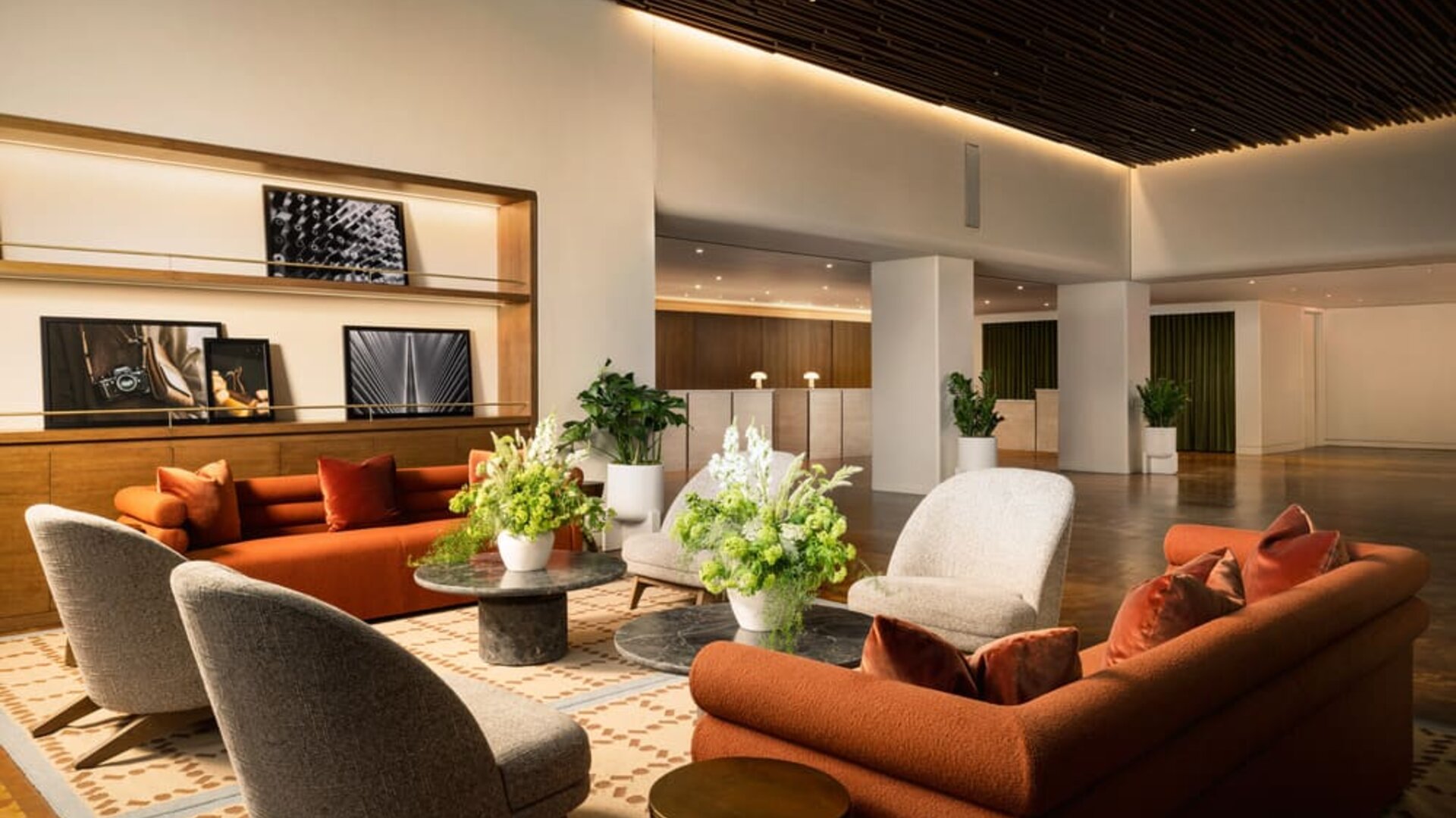 Inviting lounge area featuring contemporary furnishings, warm décor, and comfortable seating spaces for relaxation and socializing at Row NYC.