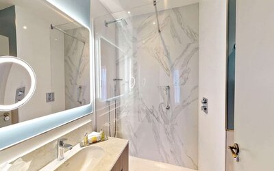 Guest bathroom with shower at DoubleTree By Hilton London Angel Kings Cross.