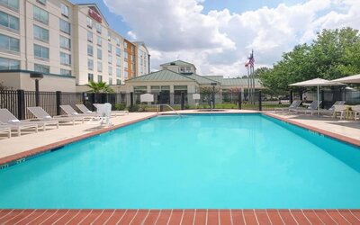 Refreshing outdoor pool at Hilton Garden Inn IAH Houston.