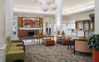 Lobby and coworking lounge at Hilton Garden Inn IAH Houston.
