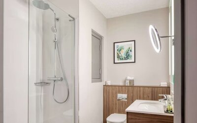 Guest bathroom with shower at DoubleTree By Hilton London - Chelsea.