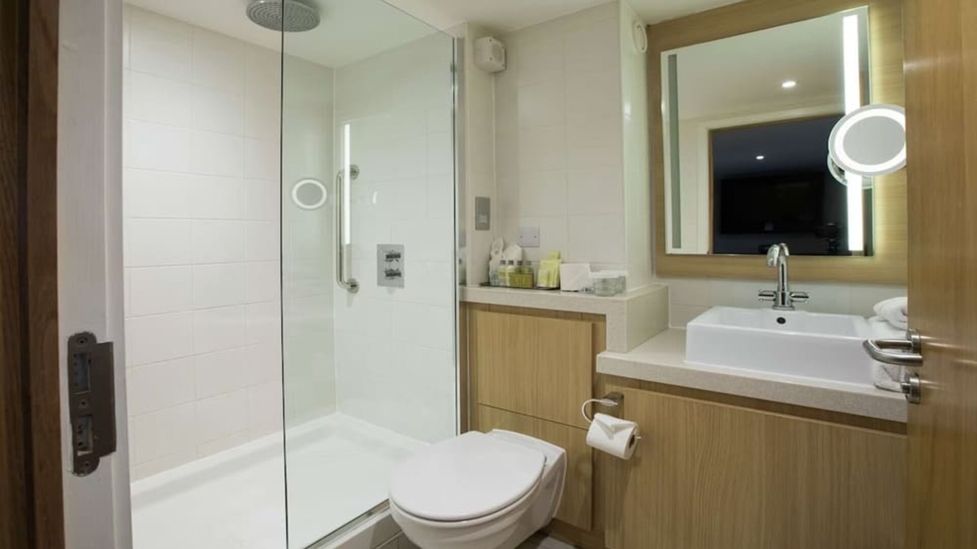 Guest bathroom with shower at DoubleTree By Hilton Coventry Building Society Arena.