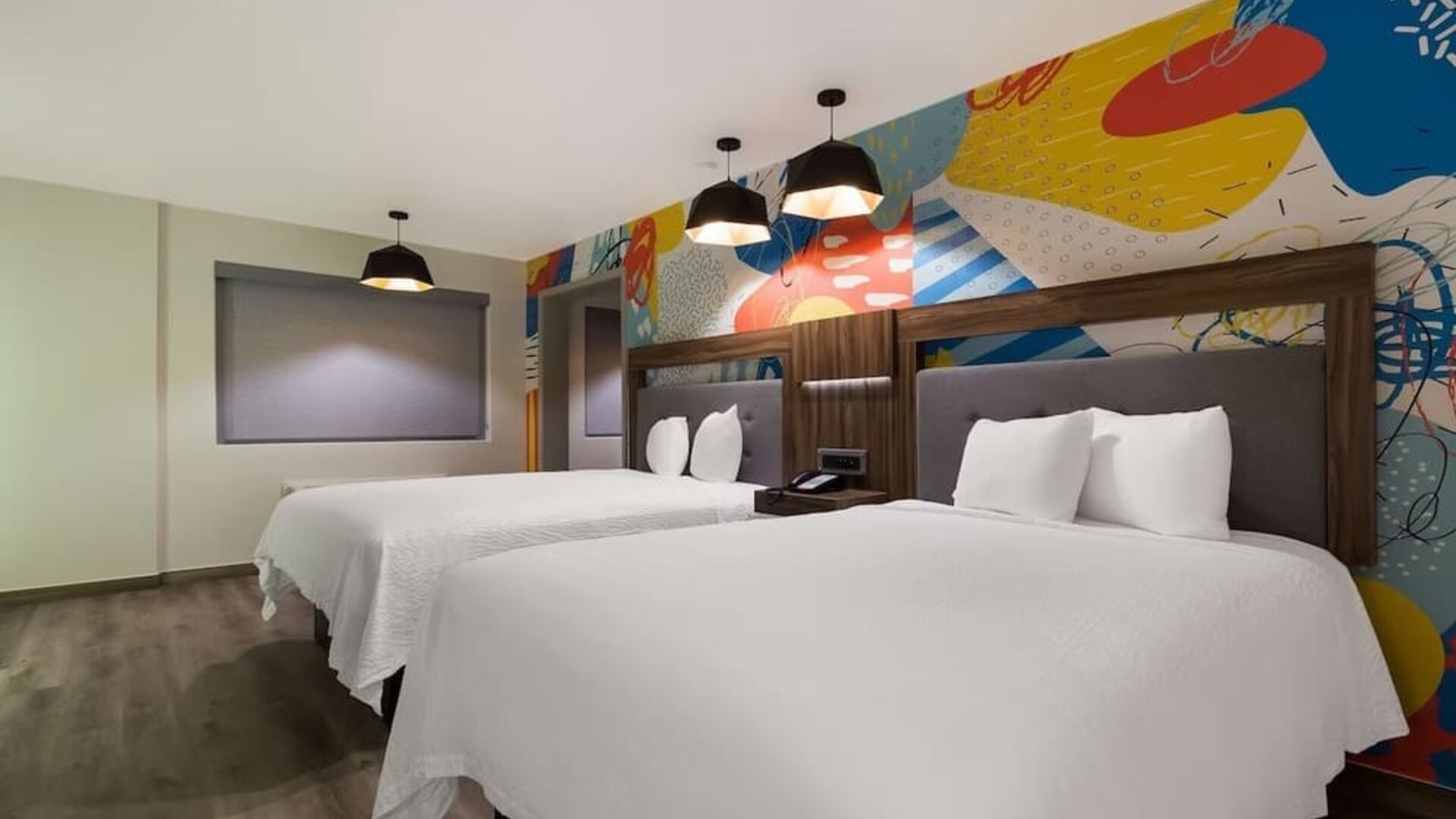 Day use room with queen beds at Signature Inn Houston Galleria.