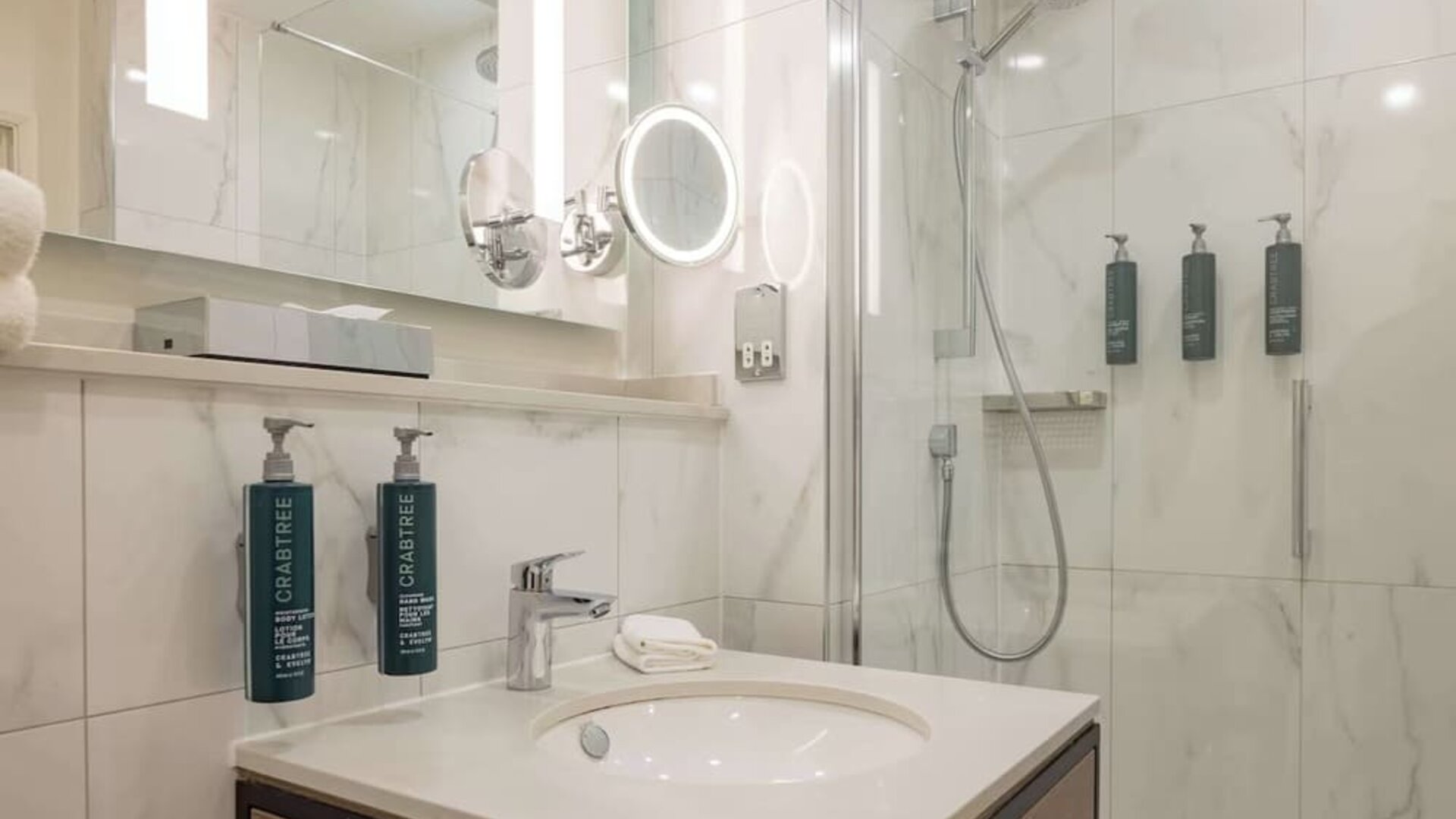 Guest bathroom with shower at DoubleTree By Hilton Manchester Airport.