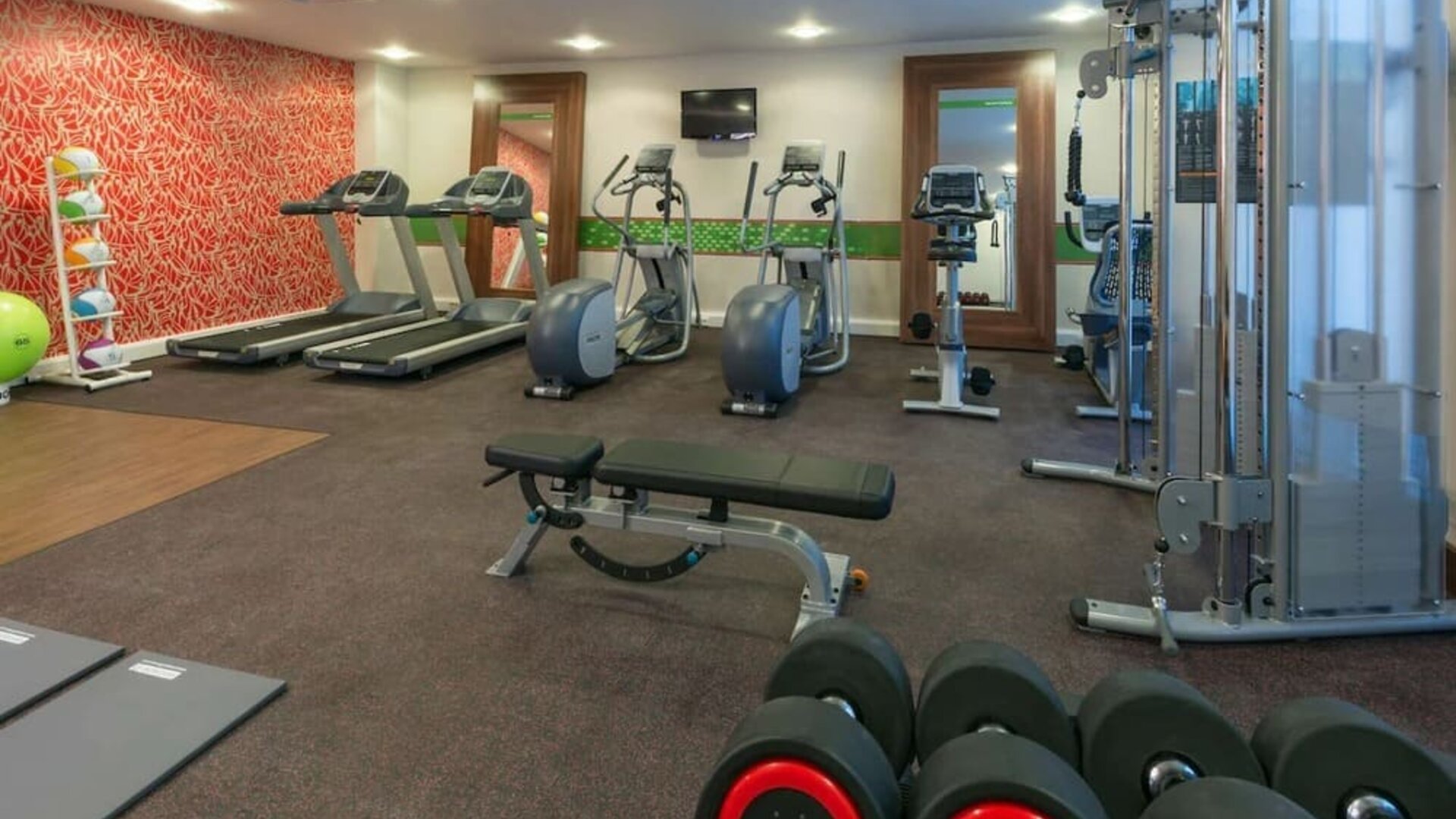 Fitness center available at Hampton By Hilton London Luton Airport.