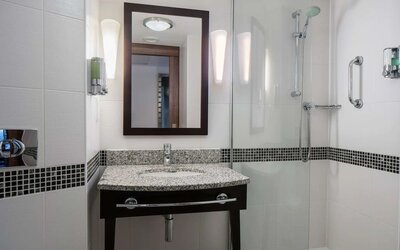 Private bathroom with shower at Hampton By Hilton Birmingham Broad Street.