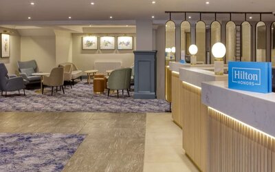 Lobby and coworking lounge at Hilton Cobham.
