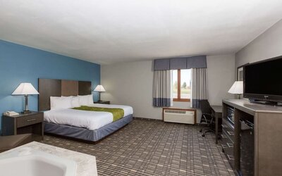 Spacious king suite with jacuzzi bath at Baymont By Wyndham Pella.