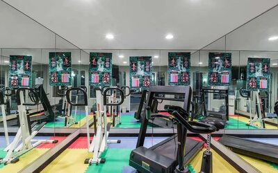 Fitness center at Baymont By Wyndham Pella.