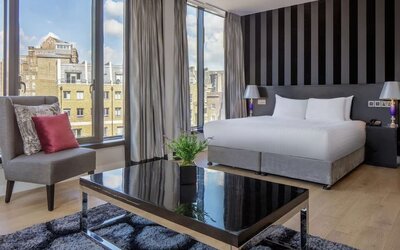 Spacious king suite with city views at DoubleTree by Hilton London Greenwich.